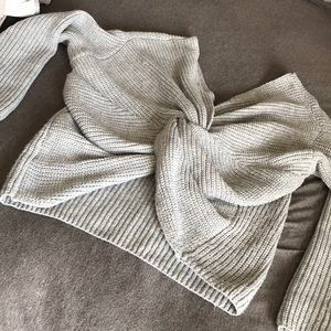 Grey sweater with cute twist back detail!